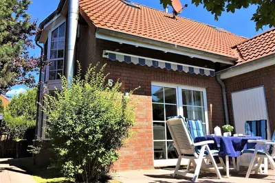 Image de Maison de vacances récemment meublée près de la digue bien adaptée aux familles avec WiFi