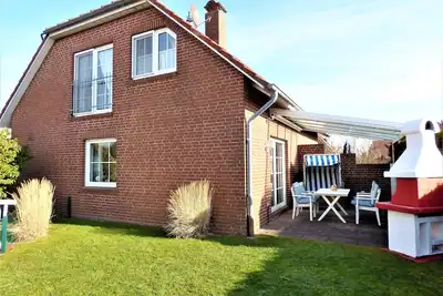 Image de Maison de vacances récemment meublée et rénovée à Neßmersiel. Quartier calme. Fi