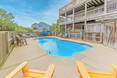 Image de Incroyable plaisir en famille et des tonnes de commodités! Vue sur la mer avec piscine, bain à remous, salle de jeux