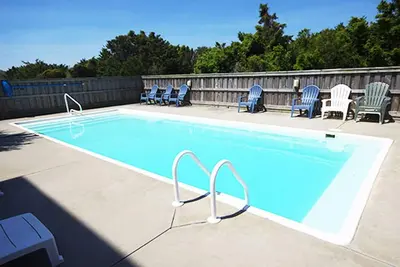 Image de Promenade courte à la plage! Semi-bord de mer w \/ Pool, bain à remous, Media Rm, Dog-Friendly