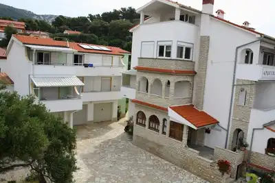 Appartement d'une chambre avec la terrasse et la vue sur le mer Rab (A-14792-c)