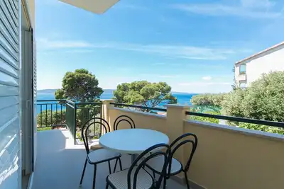 Image de Appartement de deux chambres avec le balcon et la vue sur le mer Brela, Makarska (A-2717-c)