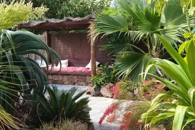 Image de El Botanico - Hébergement élégant, avec jardin tropical privé, près de la plage