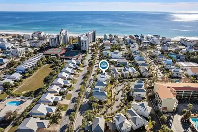 Image de Joli cottage avec deux balcons et une vue sur la plage!