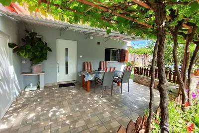 Image de Maison de vacances avec terrasse et climatisation