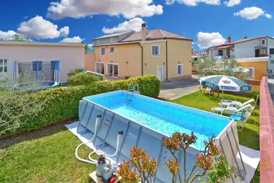 Image de Maison de vacances avec terrasse et climatisation