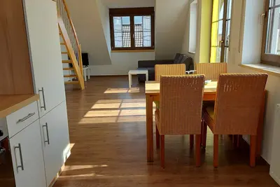 Image de Environnement Volkacher Mainschleife - Appartement dans une galerie moderne avec balcon et cuisine