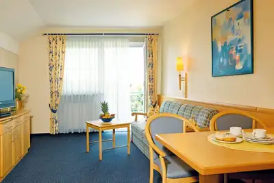 Image de Suite lumineuse et confortable avec un grand balcon et une connexion Wi-Fi