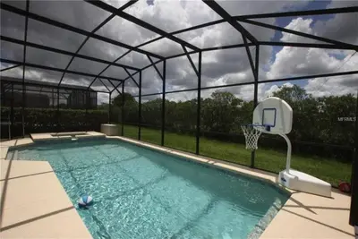 Image de 5 Bed, 5 BathTwo Story Villa avec piscine, spa et salle de jeux. 9 milles à Disney! ! !