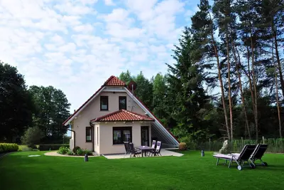 Image de Location Maison Sur Le Lac - Am See vacances Haus