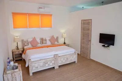 Image de Chambre Double composé de 11 chambres en front de mer