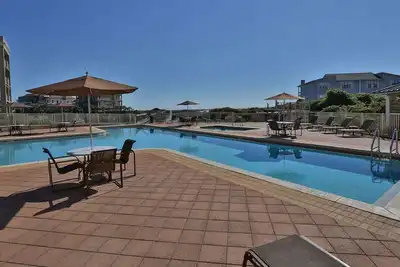 Image de Piscine chauffée - Vues du golfe - À quelques pas de la plage privée - Lotissement fermé - Promenade au Gulf Place - WiFi
