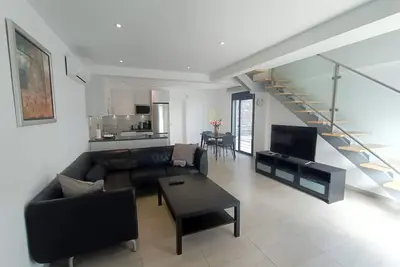 Image de Idaira Iii nouvel appartement spacieux avec garage privé et distance de marche de la plage