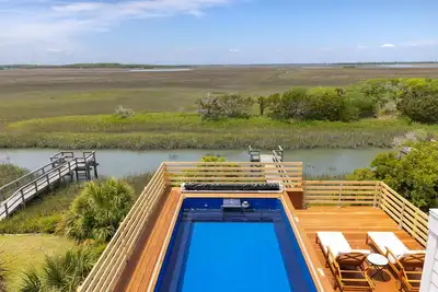 Image de 5 chambres, 5. 5 salles de bain avec vue sur le marais, l'océan et le phare!