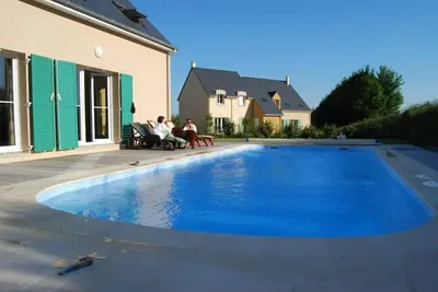 Image de Luxueuse maison neuve sur golf d'Omaha Beach, piscine privée chauffée