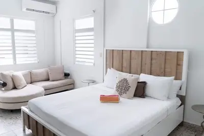 Image de Maison de plage de 8 chambres, à 15 pas de la meilleure plage de San Juan