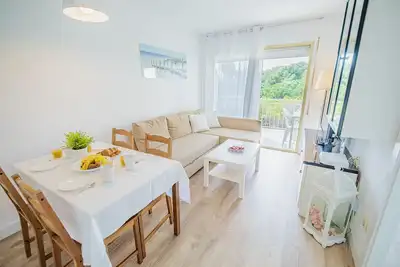 Image de Appartement familial Leomar, wifi et piscine swinmimg