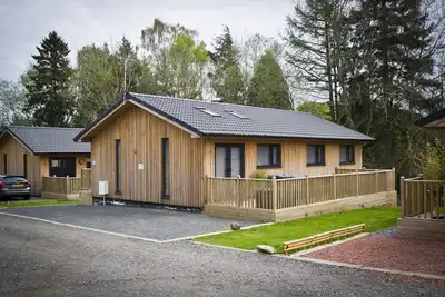 Image de The Hideaway - superbe lodge de 3 chambres avec bain à remous haut de gamme