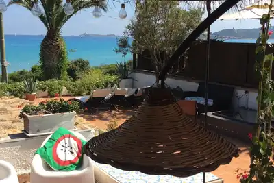 Image de House on the beach surrounded by Mediterranean bush.