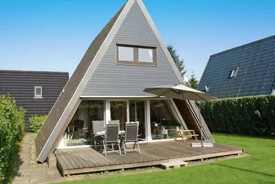 Image de Maison sur le toit avec W-Lan - Ă seulement 5 minutes de la plage - Maison sur le toit avec W-Lan - Parking devant la maison