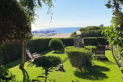 Maison de vacances avec jardin qui arrive sur le sable
