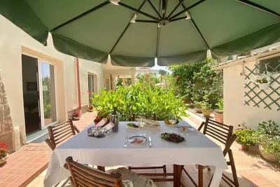 Image de Appartement pour 4 personnes face à la plage avec jardin