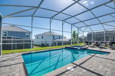 Image de Superbe maison de luxe avec piscine 9br / 5ba au Champions Gate Resort!