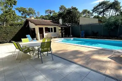 Image de Agréable villa avec piscine chauffée et Wifi proche plage sud Lacanau - 21101