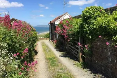 Image de Old Saltys Cottage à Westward Ho avec une vue imprenable sur la mer
