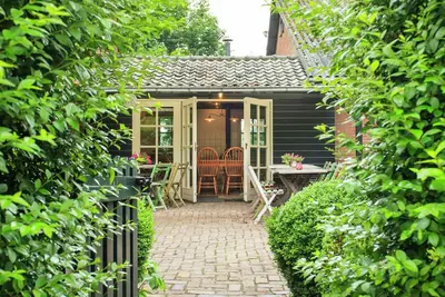 Image de Belle maison de vacances à Reusel avec cheminée