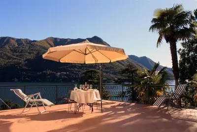 Image de Appartement élégant sur le lac de Côme avec grande terrasse. Carate Urio (Como)