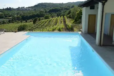 Image de Bel appartement avec Wifi, piscine, Tv, animaux admis et parking, près de Arezzo