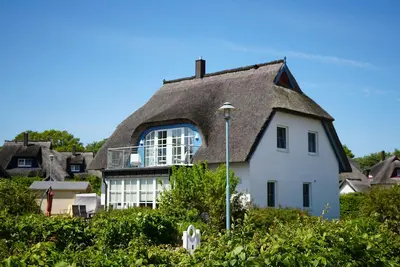 Image de Maison \"Blue Wonder\" sous le chaume sur les backwaters avec sauna, cheminée et Internet sans fil