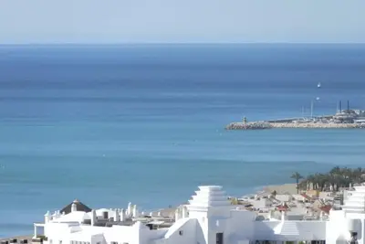 Image de La Nogalera Vue imprenable mer & mont, terrasse, plage à pied et piscines