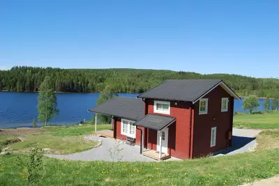 Image de Cabane de luxe sur un lac avec sauna, Wi-Fi gratuit et vue imprenable