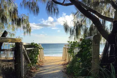 Image de 20 étapes vers le sable! - Appartement en bord de mer! Aucune route à traverser