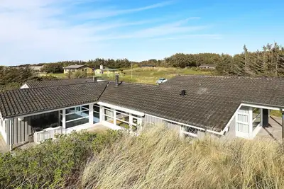 Image de Maison de vacances pour 10 a Løkken