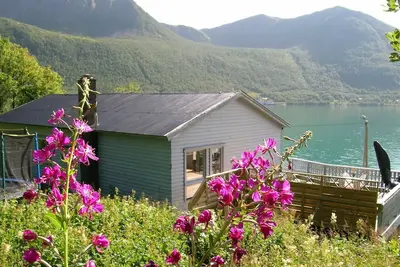Image de Maison de vacances pour 10 a Kaldfarnes-By Traum