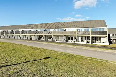 Image de Maison de vacances pour 6 a Fanø-By Traum