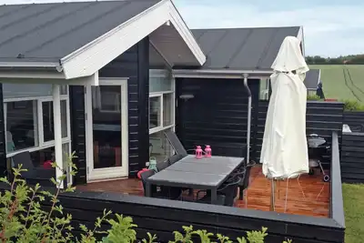 Image de Maison de vacances pour 6 a Tranekær-By Traum
