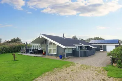 Image de Maison de vacances pour 8 a Løkken-By Traum