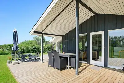 Image de Maison de vacances pour 6 a Strandby-By Traum