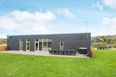 Image de Maison de vacances pour 14 a Glesborg-By Traum