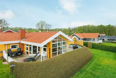 Image de Maison de vacances pour 8 a Sjølund-By Traum