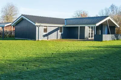 Image de Maison de vacances pour 8 a Børkop-By Traum