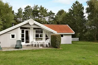 Image de Maison de vacances pour 8 a Rødby-By Traum
