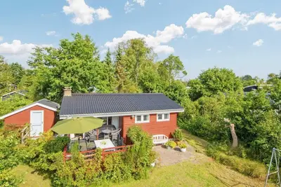 Image de Maison de vacances pour 4 a Grenaa-By Traum
