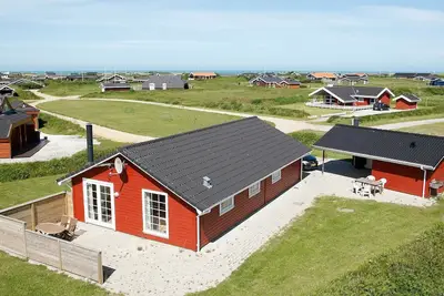 Image de Maison de vacances pour 8 a Løkken-By Traum