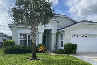 Image de Villa Windsor Palms avec piscine privée et bain à remous à quelques minutes de Disney et du golf