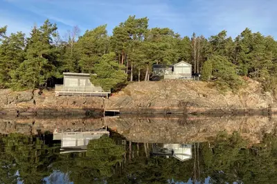 Image de Chalet au bord du lac avec vue spectaculaire et emplacement privé et exclusif